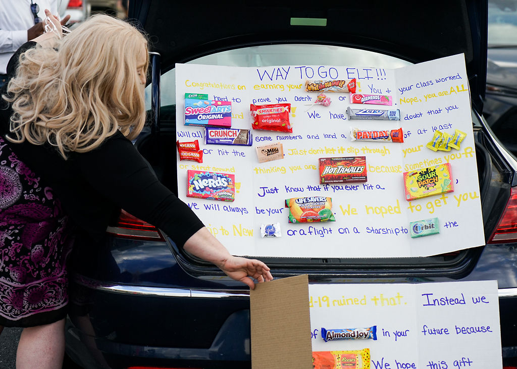 Tosha Jones shows a hand-made board for her son